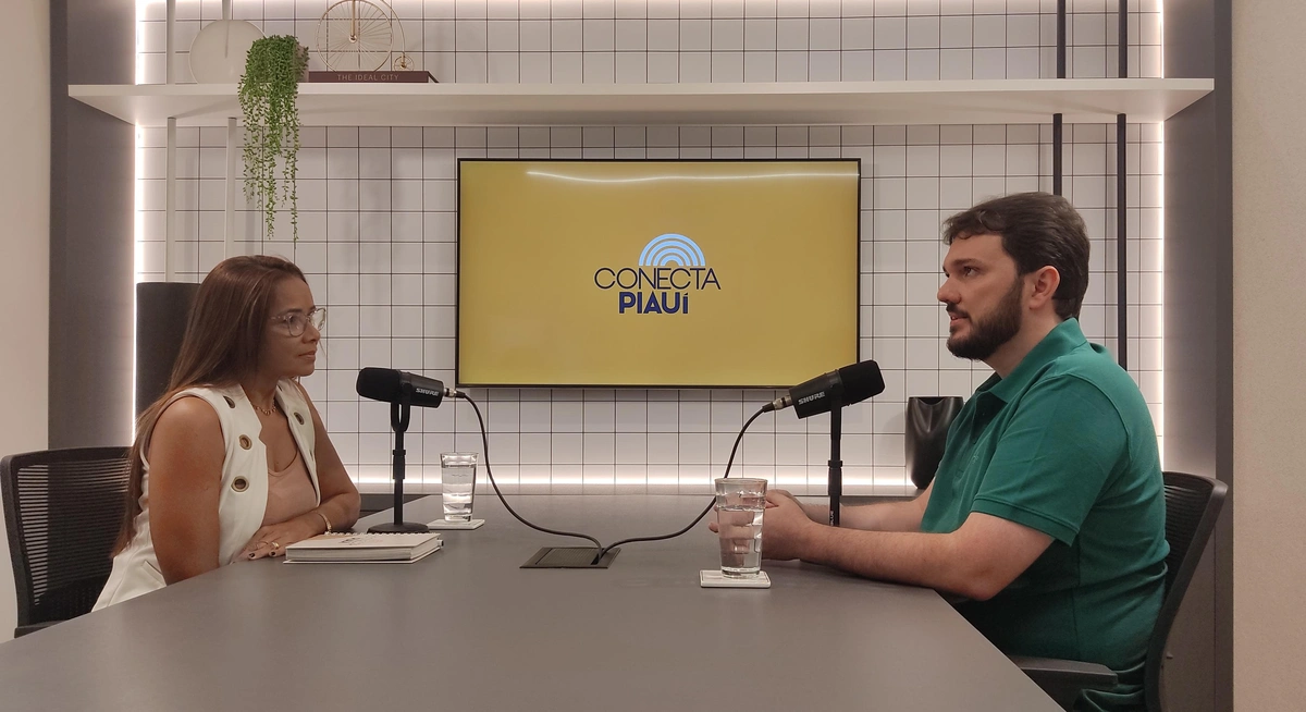 Jornalista Eugênia Reis e Floro Manuel